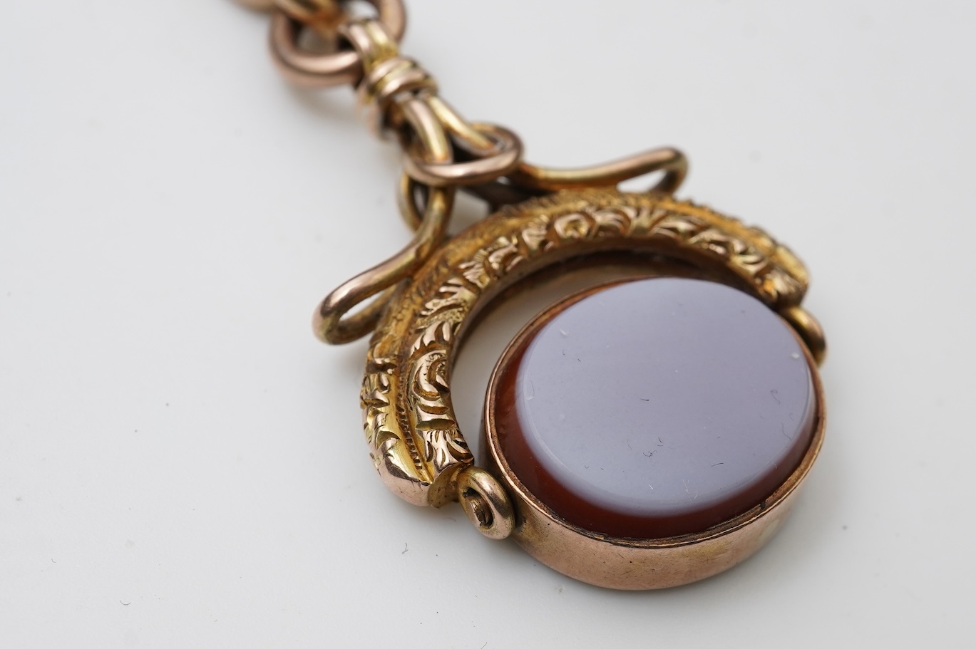 A Victorian gold chain and fob seal